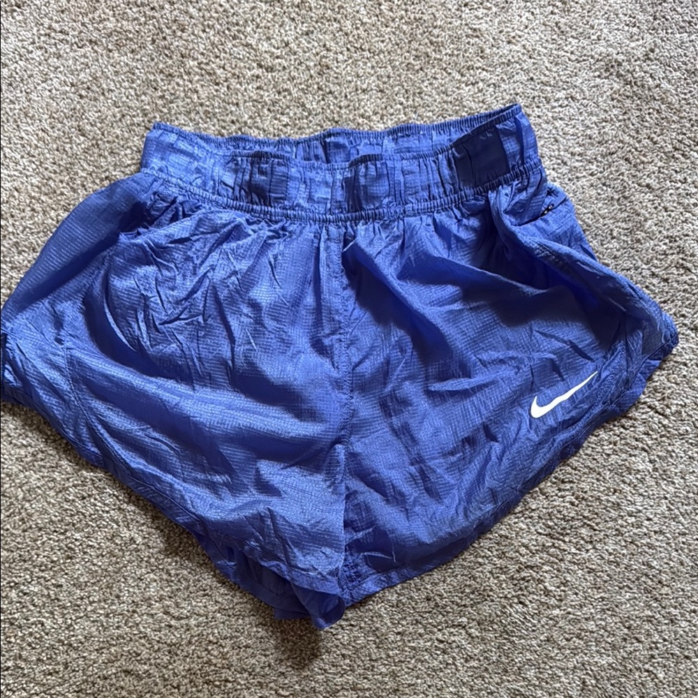 Nike Women's Royal Blue Athletic Running Shorts with White Swoosh